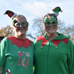 Two women dressed as elves