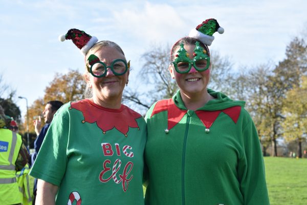 Two women dressed as elves