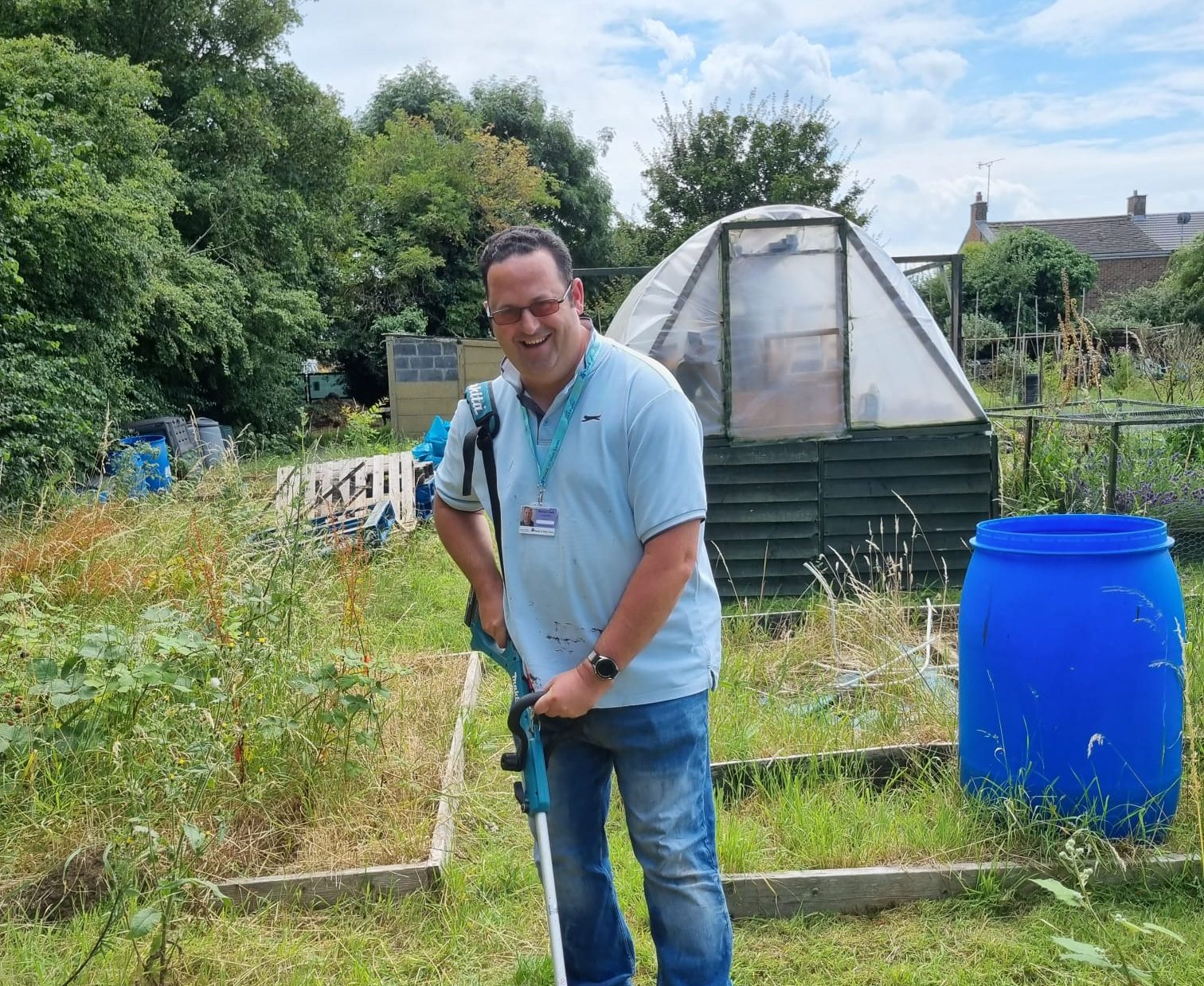 Volunteer in allotment garden